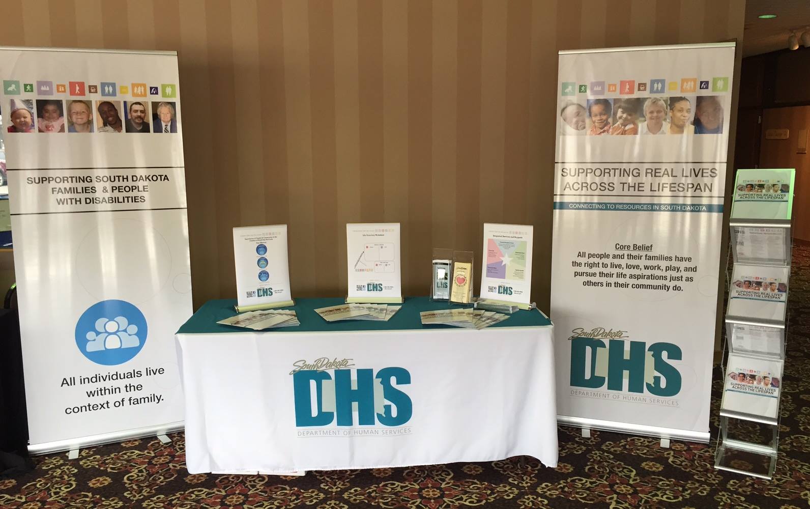 Photo: Custom display banners and booth materials using the LifeCourse framework branding developed by the South Dakota Department of Human Services